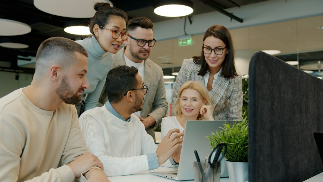team using digital tools in office