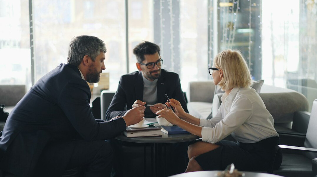 colleagues discussing in meeting